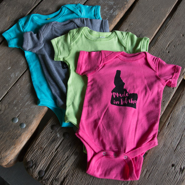 Made in Idaho Onesie, Assorted Color Options. Eco-friendly waterbased inks