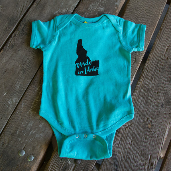 Made in Idaho Onesie, Assorted Color Options. Eco-friendly waterbased inks