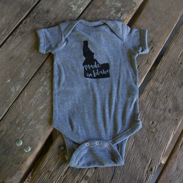 Made in Idaho Onesie, Assorted Color Options. Eco-friendly waterbased inks
